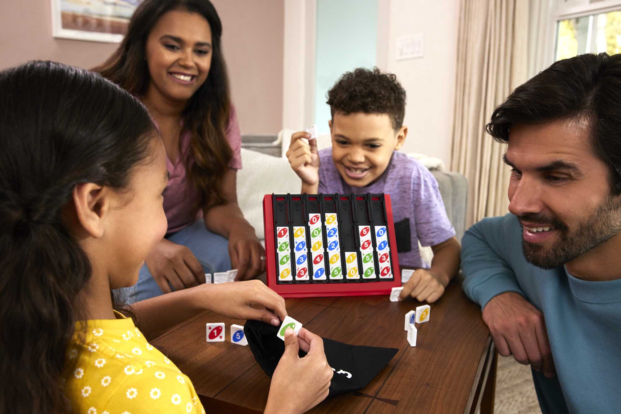 UNO Quatro Game For Adult. Family & Game Night. 2 To 4 Players. Ages 7 Years & Up - Image 2